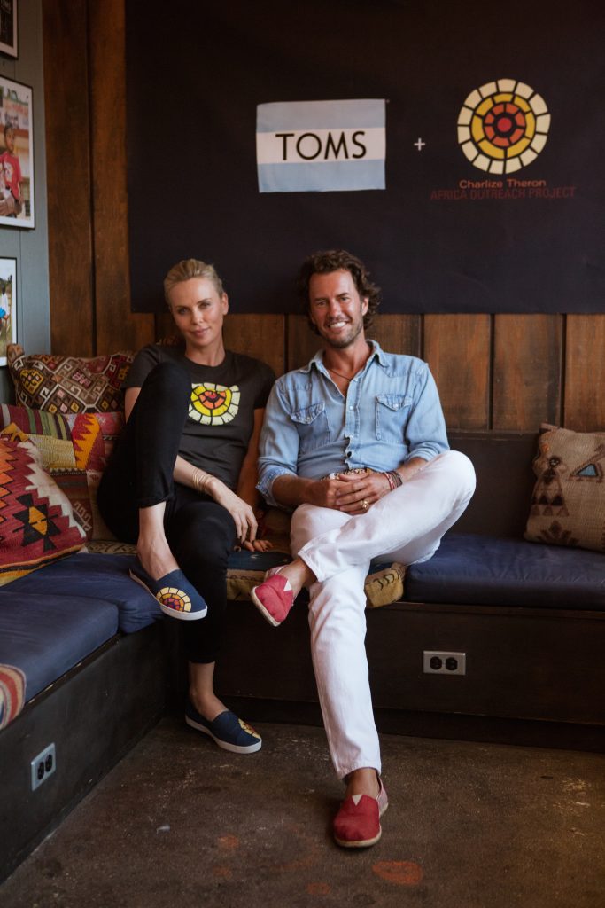 Charlize Theron & Blake Mycoskie of TOMS Celebrate: Partnership Launch