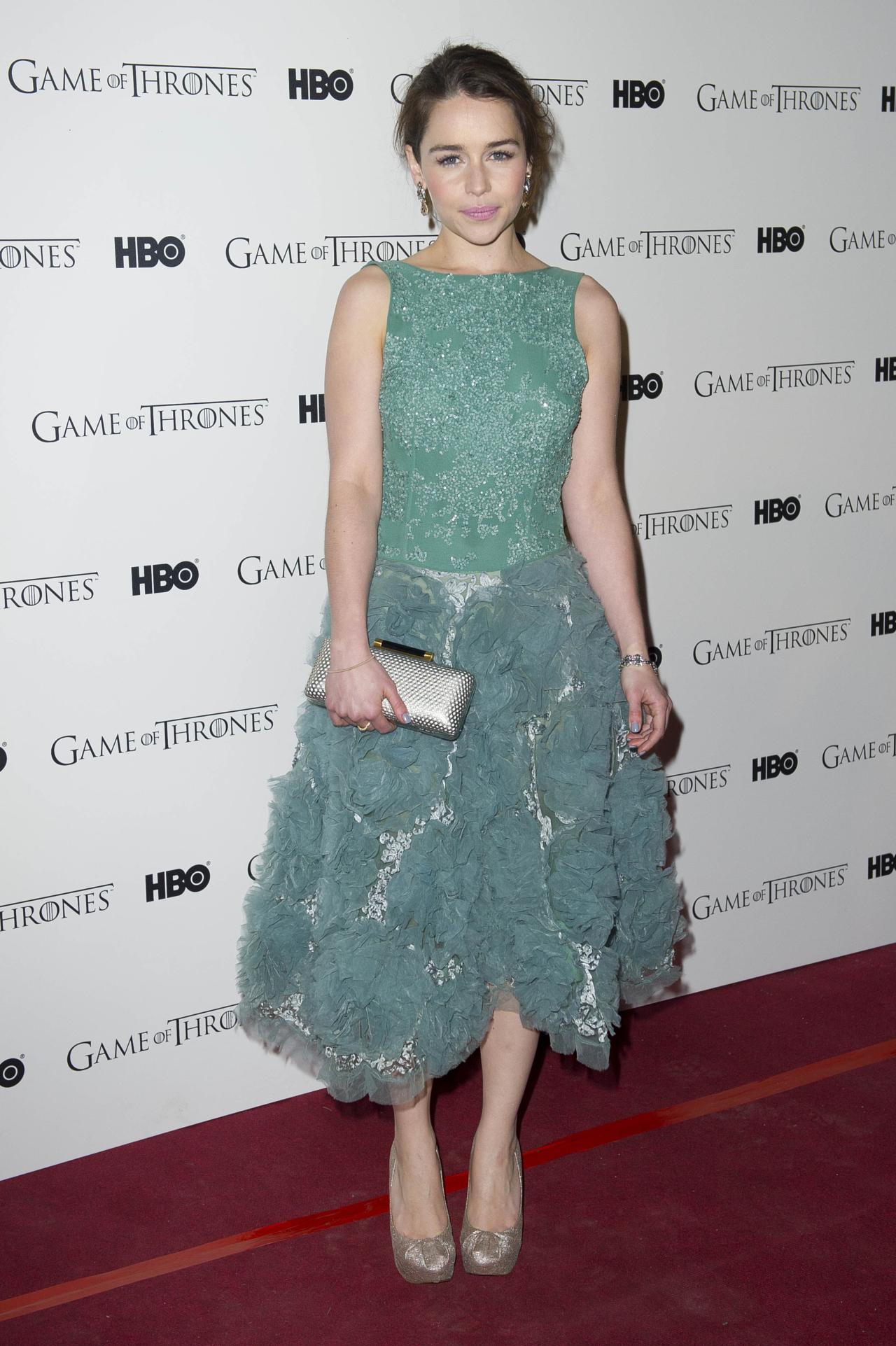 British actress Emilia Clarke arrives for the Game Of Thrones launch event at a central London venue, Wednesday, Feb. 29, 2012. (AP Photo/Jonathan Short)