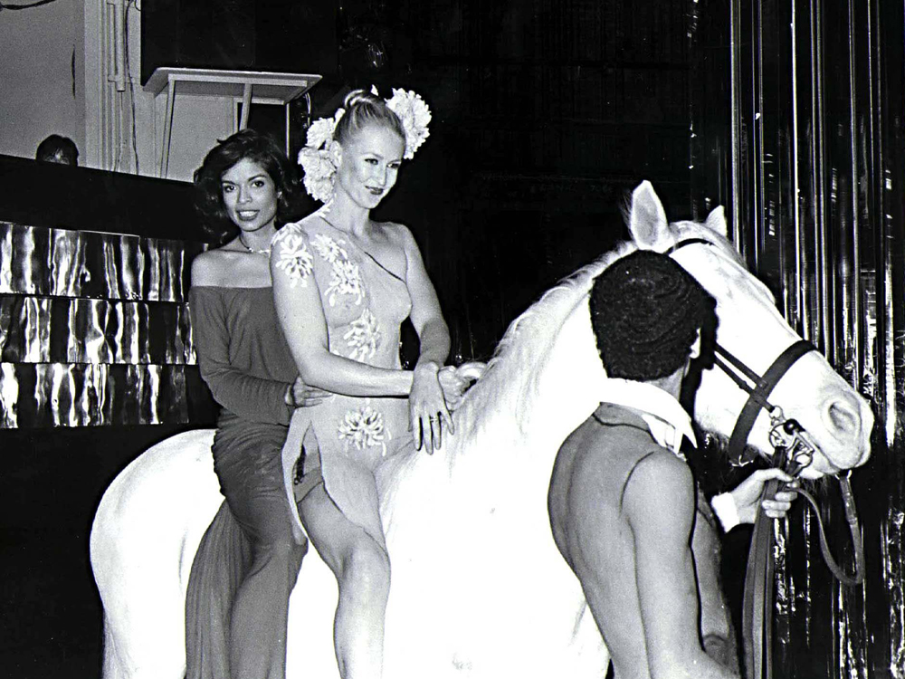 Mandatory Credit: Photo by ZUMA/REX (3654811a) Bianca Jagger and a Halston Model Ride into Studio 54 for Bianca's Birthday Party Bianca Jagger and a Halston Model Ride into Studio 54 for Bianca's Birthday Party, New York, America - 1970s