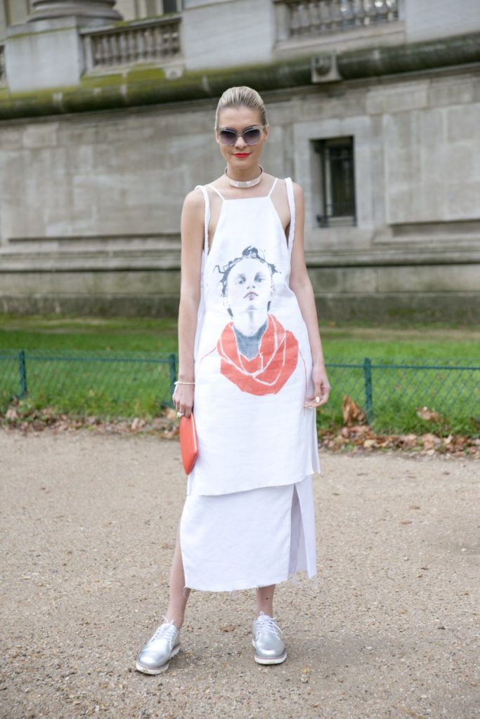 PARIS, FRANCE - OCTOBER 6: Fashion Blogger Dasha Gold wears a Furla bag, Pared sunglasses, Elect shoes, Amy Christina Lawrance dress, Lemon jewellery and Illesteva sunglasses on day 8 during Paris Fashion Week Spring/Summer 2016/17 on October 6, 2015 in Paris, France. (Photo by Kirstin Sinclair/Getty Images)*** Local Caption *** Dasha Gold