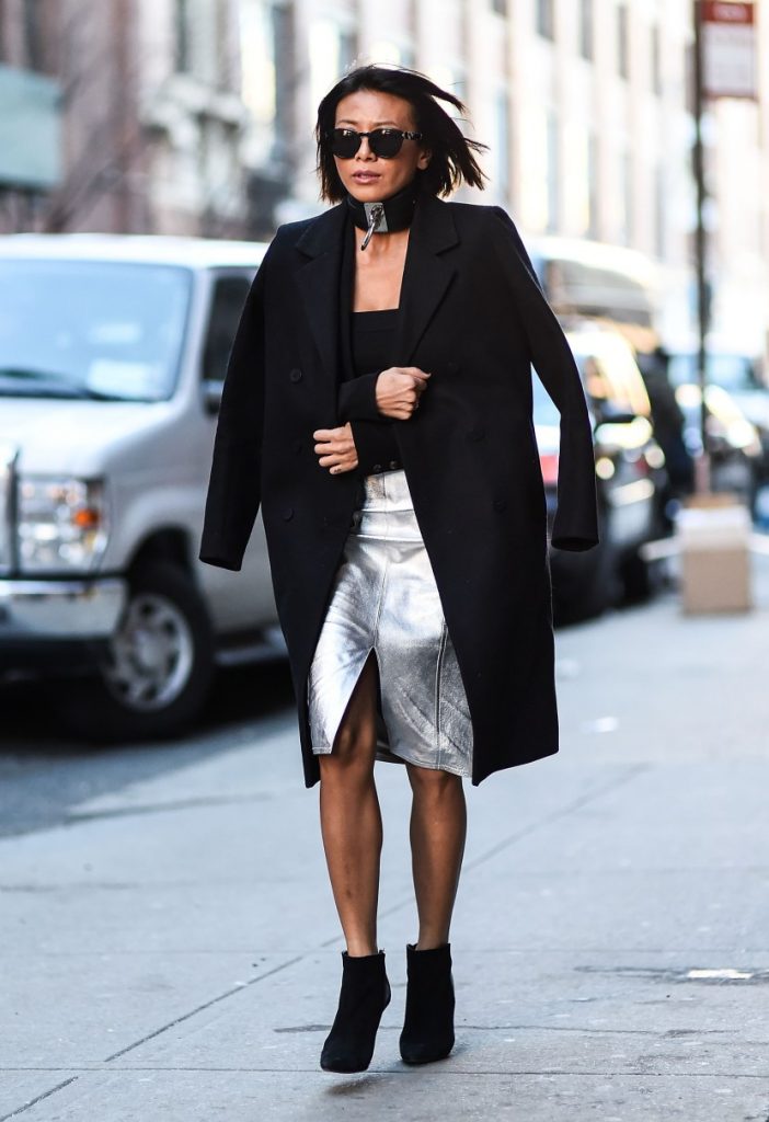 NEW YORK, NY - FEBRUARY 14: A guest is seen outside the Jonathan Simkhai show wearing a choker, black coat and silver shiny skirt during New York Fashion Week: Women's Fall/Winter 2016 on February 14, 2016 in New York City. (Photo by Daniel Zuchnik/Getty Images)