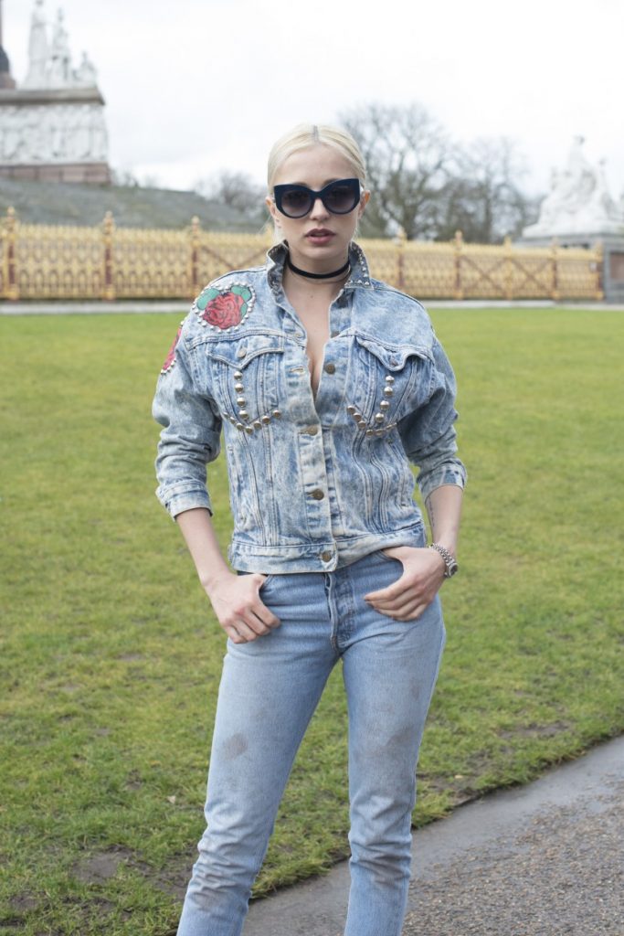 LONDON, ENGLAND - FEBRUARY 22: Singer Caroline Vreeland wears a customised vintage jacket, Levi's jeans and MaxMara sunglasses on day 4 during London Fashion Week Autumn/Winter 2016/17 on February 22, 2016 in London, England. (Photo by Kirstin Sinclair/Getty Images)*** Local Caption *** Caroline Vreeland