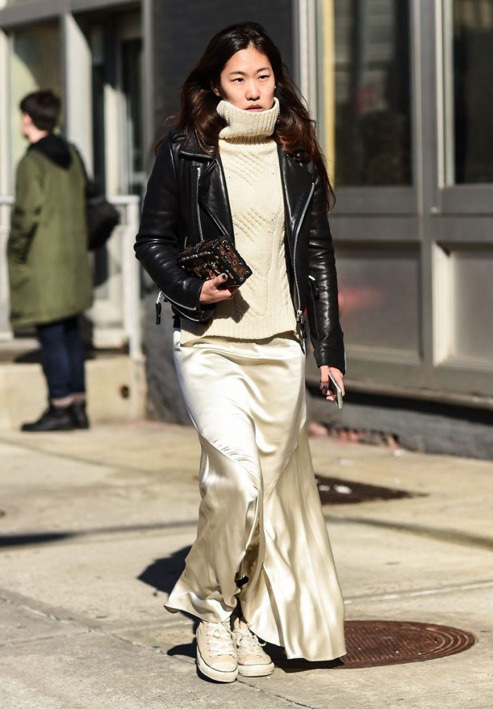 NEW YORK, NY - FEBRUARY 18: A guest is seen outside the Calvin Klein show wearing a black leather jacket and white sweater and white pants during New York Fashion Week: Women's Fall/Winter 2016 on February 18, 2016 in New York City. (Photo by Daniel Zuchnik/Getty Images)