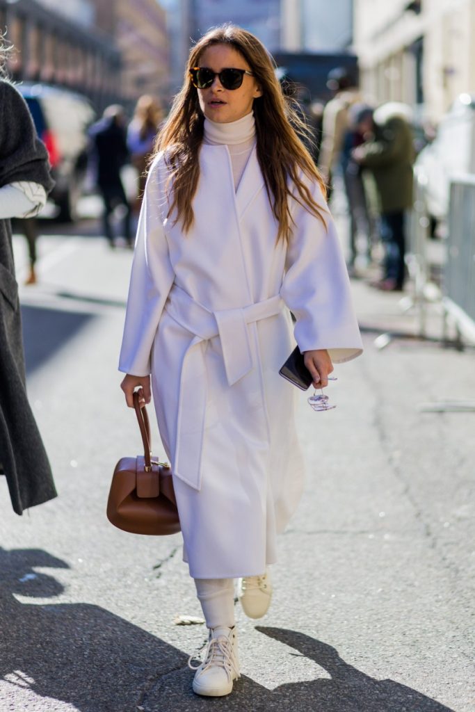 NEW YORK, NY - FEBRUARY 18: Miroslava Duma wearing a white wool coat and a brown Loewe bag seen outside Ralph Lauren during New York Fashion Week: Women's Fall/Winter 2016 on February 18, 2016 in New York City. (Photo by Christian Vierig/Getty Images)