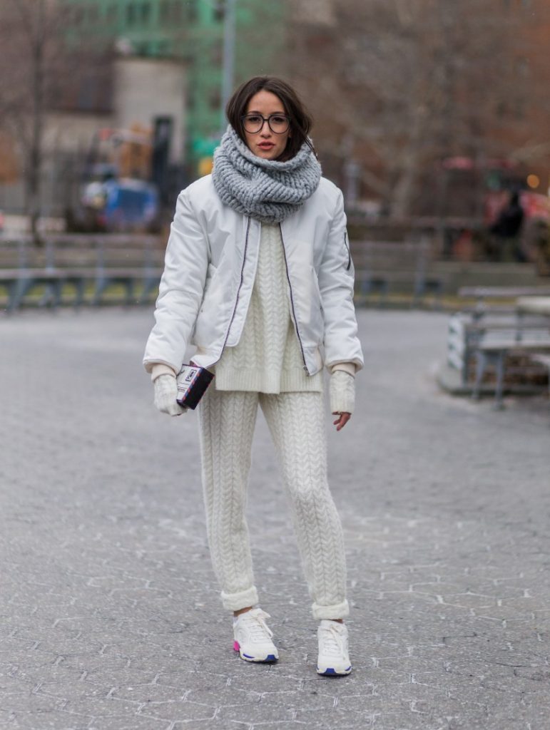 NEW YORK, NY - FEBRUARY 13: Alex of Alexs Cloest wearing a creme knitwear suit and a white bomber jacket and sneaker seen outside Lacoste during New York Fashion Week: Women's Fall/Winter 2016 on February 13, 2016 in New York City. (Photo by Christian Vierig/Getty Images)