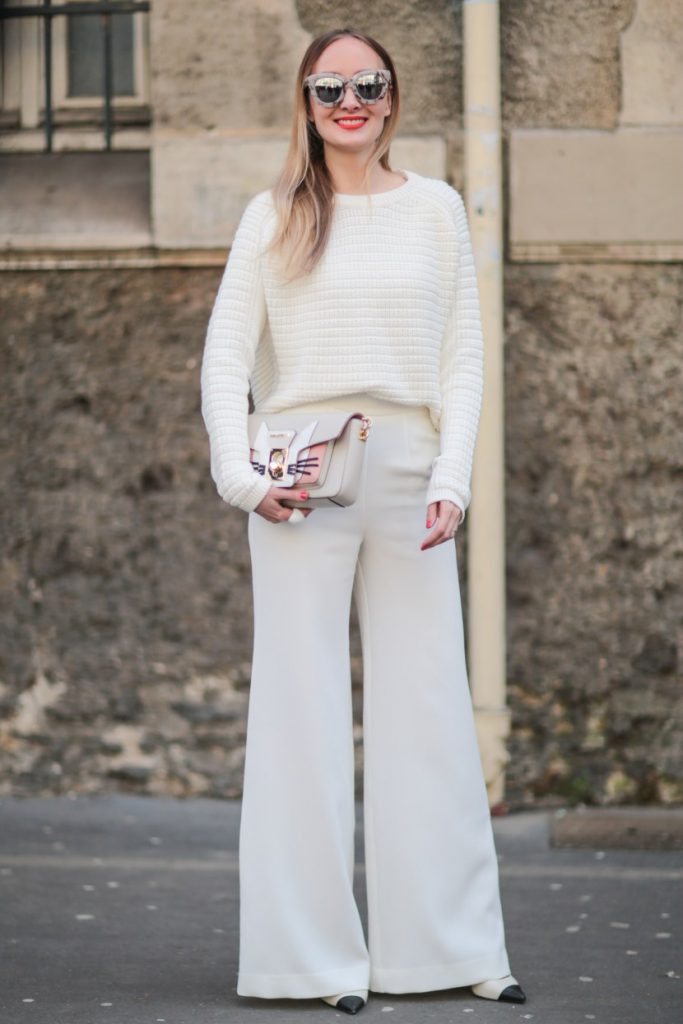 PARIS, FRANCE - MARCH 06: Sandra Kleine Staarman (morestylethanfashion) is wearing a Karl Lagerfeld bag, and a white total look, before the John Galliano show, during Paris Fashion Week, Womenswear Fall Winter 2016/2017, on March 6, 2016 in Paris, France. (Photo by Edward Berthelot/Getty Images)