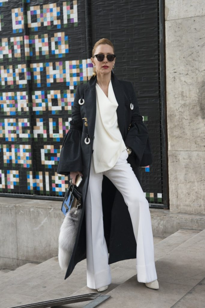 PARIS, FRANCE - MARCH 8: Fashion buyer Elina Halimi wears an Ellery jacket, Celine top and bag , Stella McCartney trousers, Michelle Elie earrings, Aperlai shoes, Gentle Monster sunglasses on day 8 during Paris Fashion Week Autumn/Winter 2016/17 on March 8, 2016 in Paris, France. (Photo by Kirstin Sinclair/Getty Images)*** Local Caption *** Elina Halimi