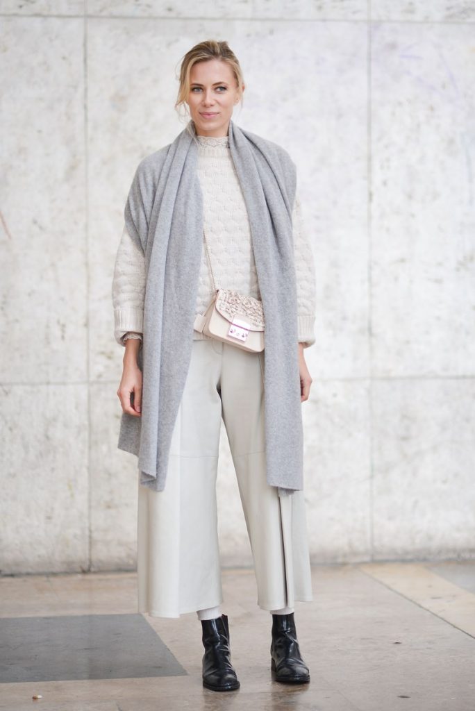 PARIS, FRANCE - MARCH 01: Elizabeth Minett poses wearing a Zadig and Voltaire jumper, Each X Other pants, Furla bag and St. Laurent shoes before the Anrealage show at the Palais de Tokyo during Paris Fashion Week Fall/Winter 16/17 on March 1, 2016 in Paris, France. (Photo by Vanni Bassetti/Getty Images)