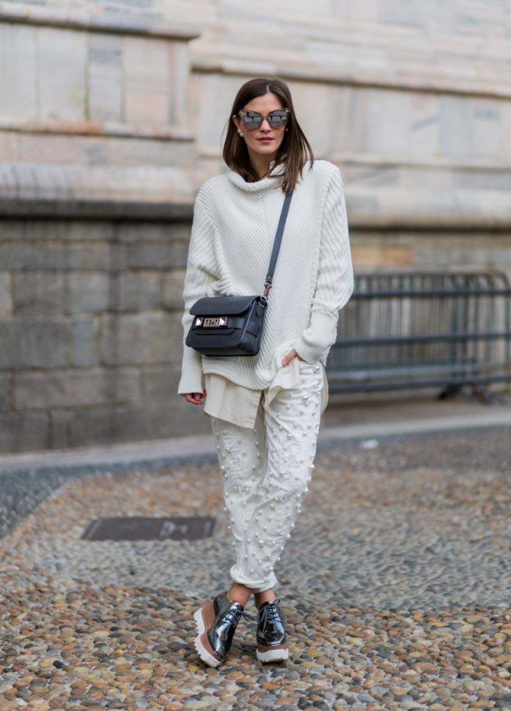 MILAN, ITALY - FEBRUARY 25: Nina Schwichtenberg wearing Escada pants, Proenza Shouler bag, Stella McCartney shoes seen outside during Milan Fashion Week Fall/Winter 2016/17 on February 25, 2016, in Milan, Italy (Photo by Christian Vierig/Getty Images)