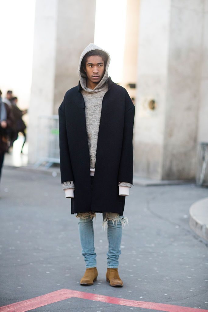 PARIS, FRANCE - JANUARY 21: Designer Anthony Calydon wears Nobless Couture gray hoodie, black jacket, denim jeans, and Chelsea boots on January 21, 2016 in Paris, France. (Photo by Melodie Jeng/Getty Images)