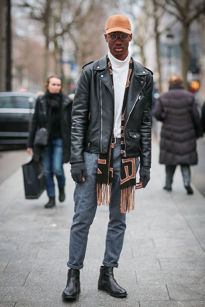 PARIS, FRANCE - JANUARY 23: Isaac Ayi wearing a Zara coat and Sandro shoes before the Balmain show during Paris Fashion Week Menswear Fall Winter 2016/2017 on January 23, 2016 in Paris, France. (Photo by Edward Berthelot/Getty Images)